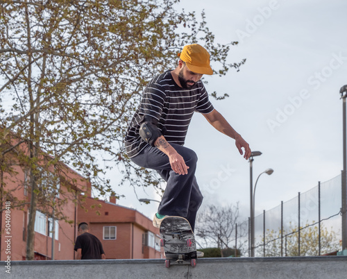 Man cruising on his skateboard in style
