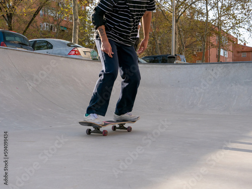 Man cruising on his skateboard in style