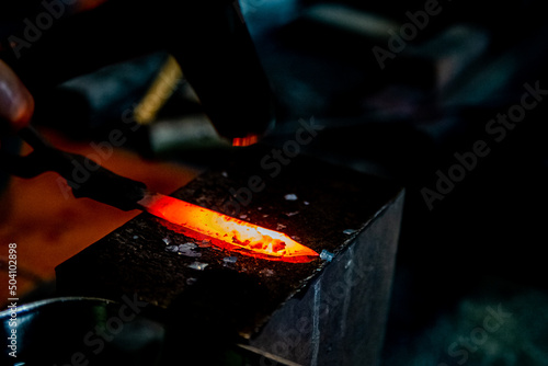 Photography Hot steel for a small Japanese kodachi sword