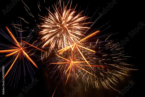 Red fireworks on the black sky background