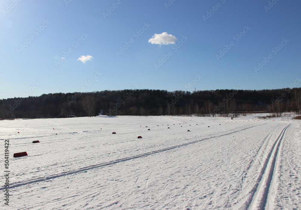 Empty ski run on a sunny winter day