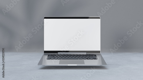 Obraz na płótnie Empty display laptop with decoration minimal. Shadow from tree on cement floor. Mock-up computer and minimalism concept, 3D Render. w salonie