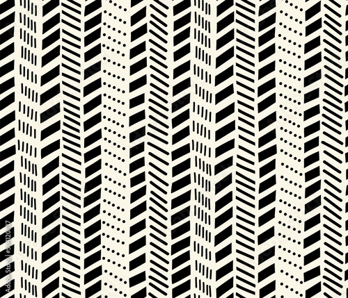Black arrows herringbone isolated on white seamless vector background. Doodle chevron hand drawn striped cute monochrome geometric repeating pattern. Vertical stripe Texture for fabric, wallpaper.