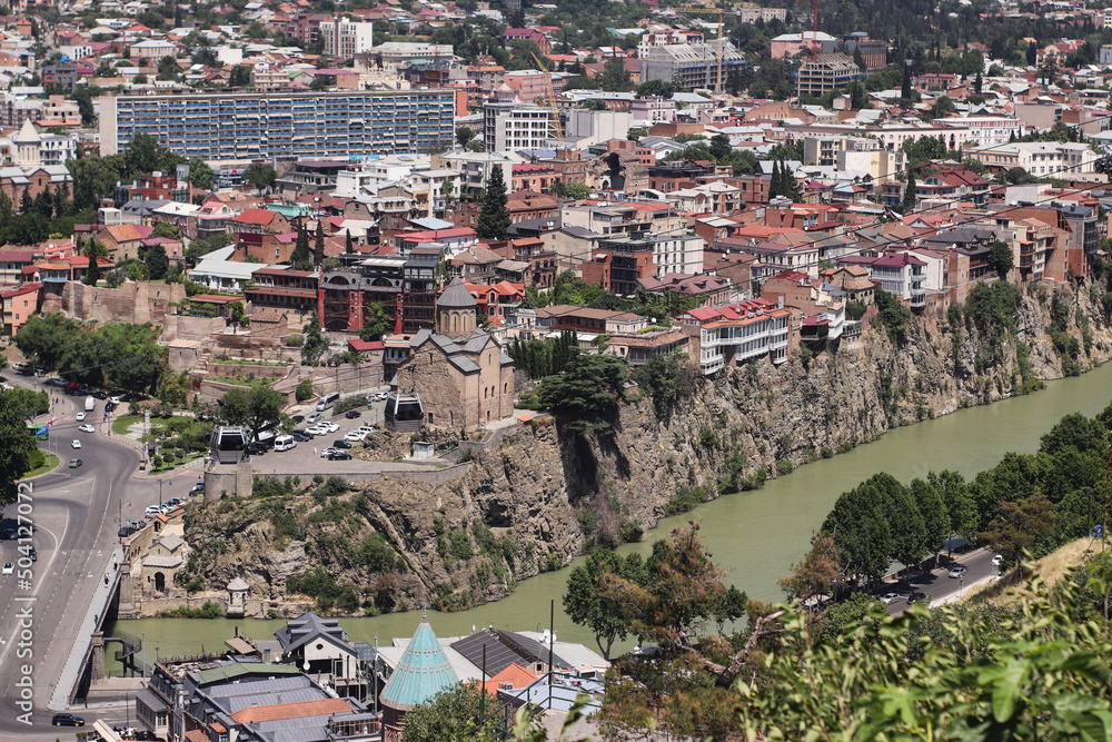 Panoramic top view of Tbilisi city and Kura river