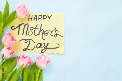 Fototapeta Naklejka Na Ścianę i Meble -  Happy Mothers day greeting card with tulip flowers
