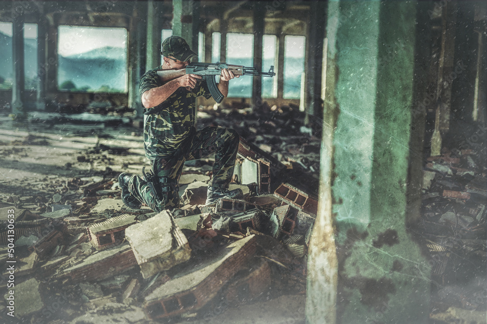 Airsoft sgrungeier in the grunge industry building. Old photo effect. Airsoft sgrungeier in the grunge industry building. Old photo effect.