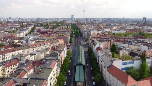 Wallpaper Mural Start at TV tower ends at elevated train subway enters the picture Marvelous aerial view flight slowly tilt down drone footage of Berlin Prenzlauer Berg Schönauer Allee Spring 2022. by Philipp Marnitz Torontodigital.ca