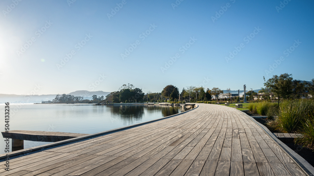 Empty Rotorua Lakefront boardwalk at sunrise, New Zealand