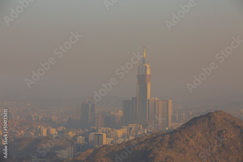 Skyline with Abraj Al Bait (Royal Clock Tower Makkah) in Makkah, Saudi Arabia. The tower is the tallest clock tower in the world at 601m (1972 feet). photo