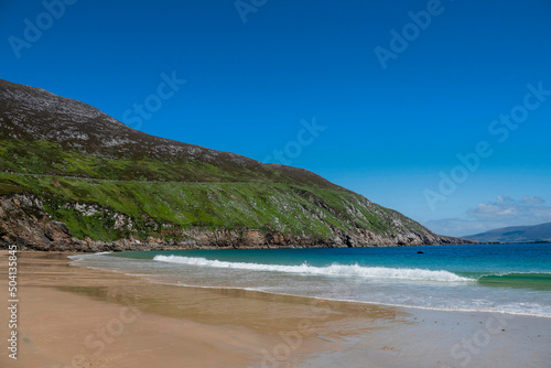 Fototapeta Naklejka Na Ścianę i Meble -  Beautiful sandy Keem beach in Achill island, county Mayo, Ireland. Warm sunny day. Popular travel area with amazing view and nature.