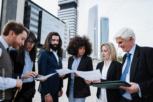 Sticker Multiracial business people working outdoor from office building- Focus on afric
