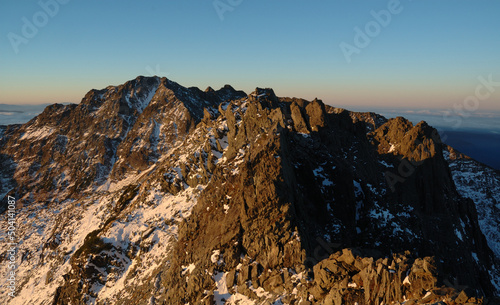 Morgenrot of Mt. Okuhotaka with virgin snow / 初冠雪した奥穂高岳の朝焼け＠上高地 photo