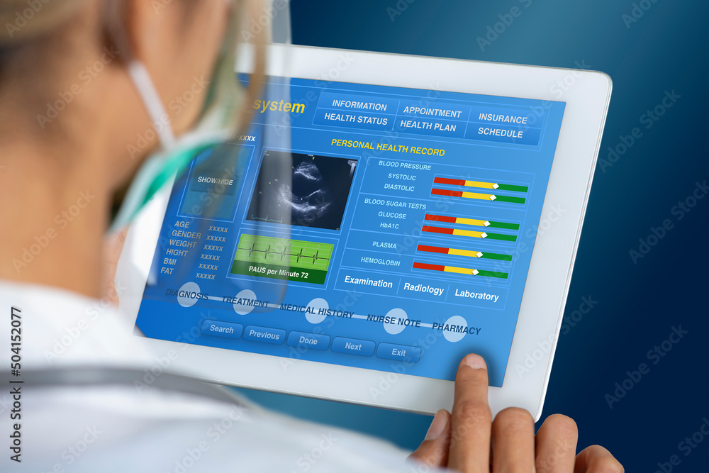 Female doctor working on electronic medical record to check patient information. Female doctor working on electronic medical record to check patient information.