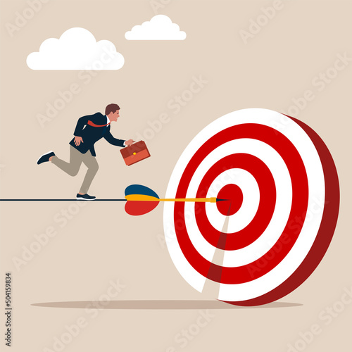Ambitious businessman running to the with the dart to target bullseye. Progress to goal or reaching business target, motivation or challenge to achieve success, career growth or improvement concept.