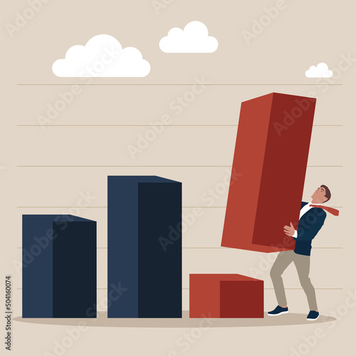 Businessman financial advisor or expert cut and hold piece of bar graph. Revenue forecast cut, stock market price correction or global economic slow down due to crisis concept. photo