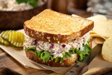 Tuna salad and lettuce sandwich on whole grain bread