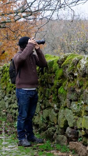 photographer in the woods
