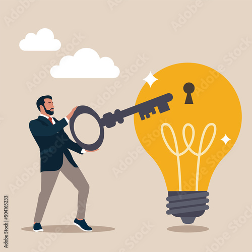 Invent new product or creativity concept, smart businessman holding golden key about to insert into key hold on lightbulb idea lamp. Unlock new business idea.