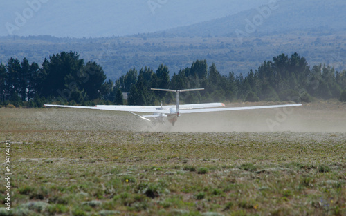 light aircraft towing ultralight glider photo