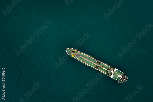 oil,gas,ship green floating on green sea background top view