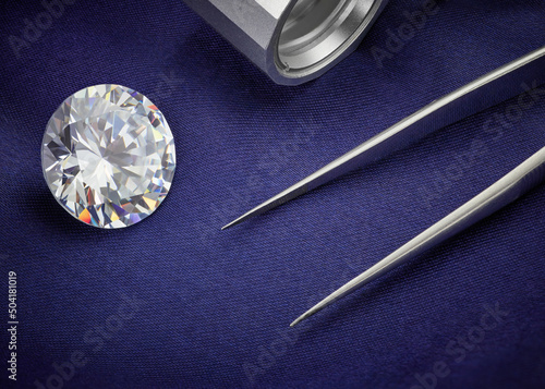 Big Diamond with Magnifying Lens and Tweezers on Blue Background. 