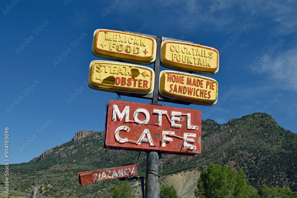 Old American motel sign from the depression era . No longer there. 