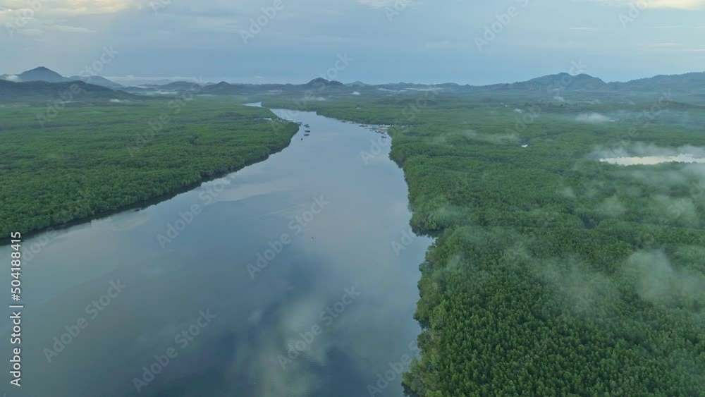 Aerial view drone shot of beautiful ocean against sky in the morning fog mist sunrise drone is flying over sea and mangrove forest Landscape High angle view Aerial view drone shot of beautiful ocean against sky in the morning fog mist sunrise drone is flying over sea and mangrove forest Landscape High angle view