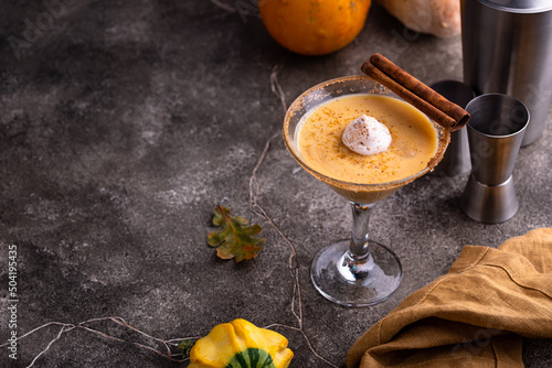 Creamy pumpkin martini cocktail or liquor photo