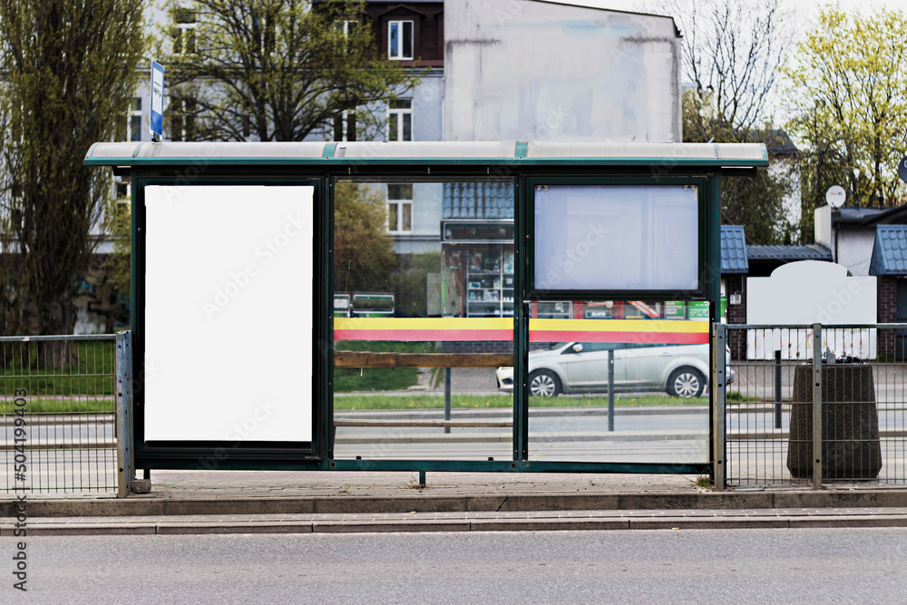 Obraz premium Mockup, white background for an ad, a bus stop on the background of the road close-up