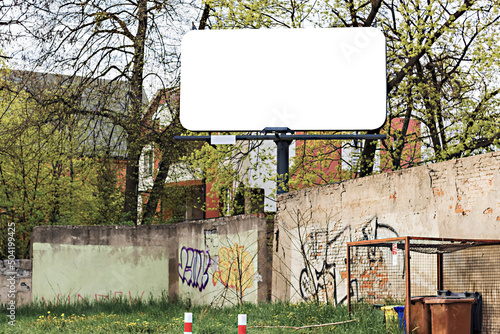 horizontal billboard against the background of old peeled walls close-up