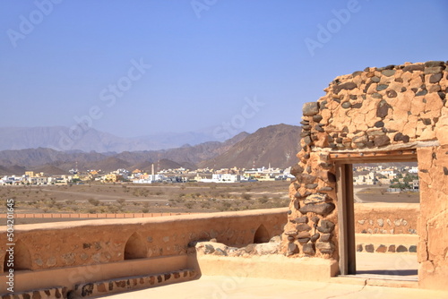 Fort Jabreen Castle beautiful historic castle in Oman, with palm trees view photo