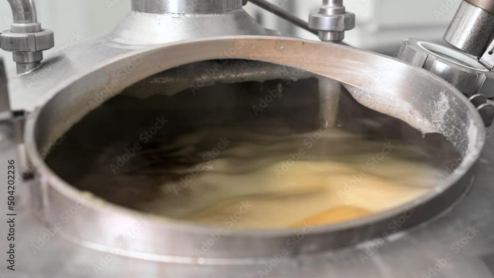 Brew tank with boiling malt. High quality 4k footage Brew tank with boiling malt. High quality 4k footage