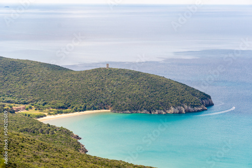 Fototapeta Naklejka Na Ścianę i Meble -  Italy Toscana Grosseto trekking at the Maremma Magliano Natural Park in Tuscany, panoramic view of the coast line, Cala di Forno and the medieval sighting tower