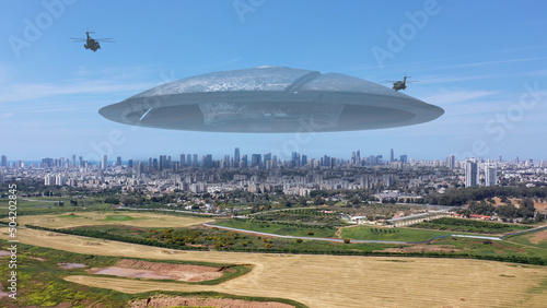 Obraz na płótnie 3d rendering, Massive ufo Flying saucer hovering over large city Aerial view
Dro