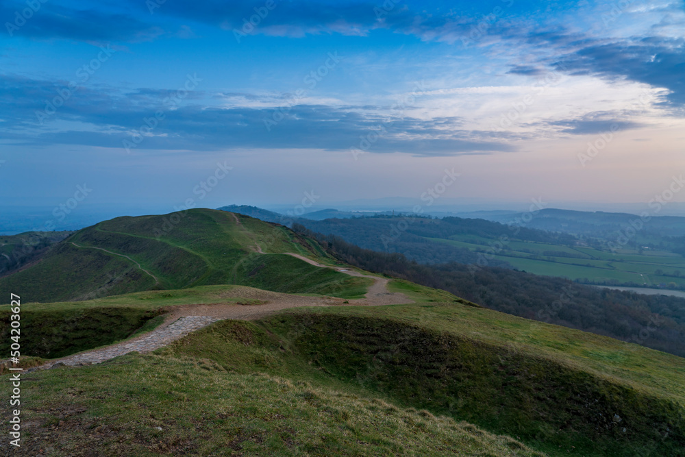 Landscape view of an ancient fort in the Malvern Hills of Herefordshire, England as seen from the top of Herefordshire Beacon.