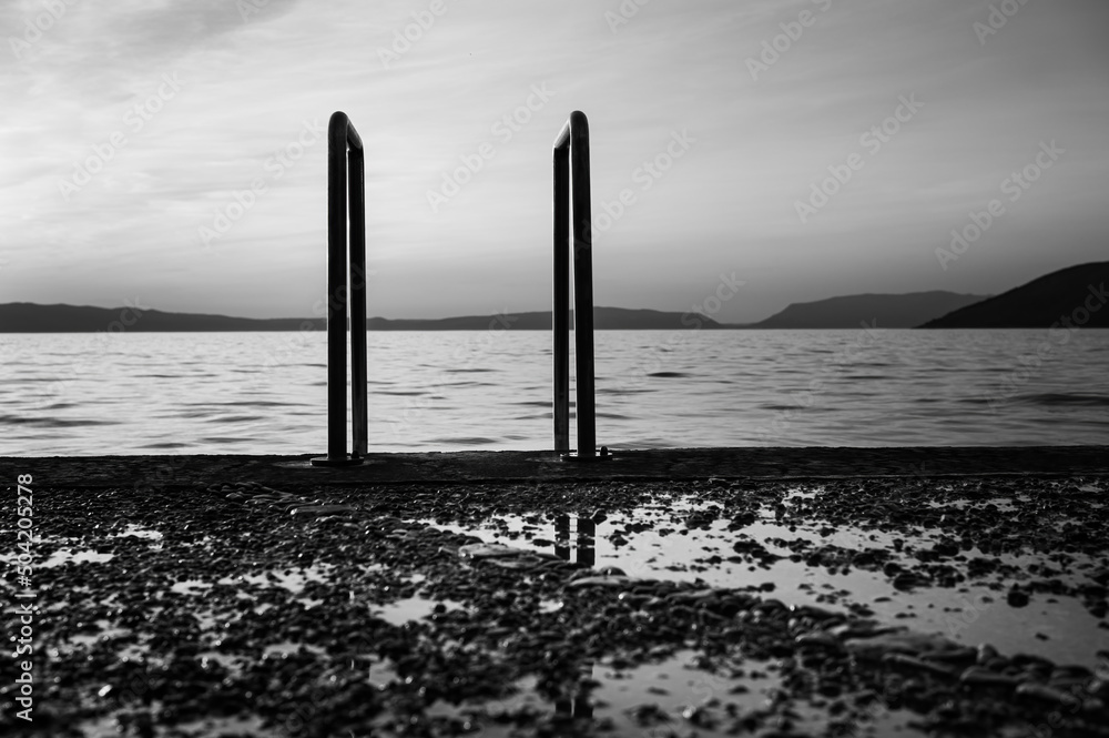 Fototapeta premium Ladder into the sea at the beach in Cres