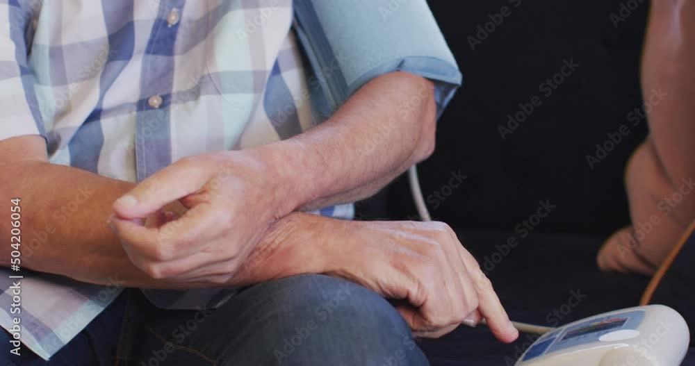Video of focused caucasian senior man checking pressure Video of focused caucasian senior man checking pressure
