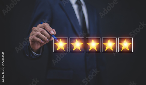 Businessman Satisfaction Assessments for Top Performing Businesses,Customer gives rating to service experience photo