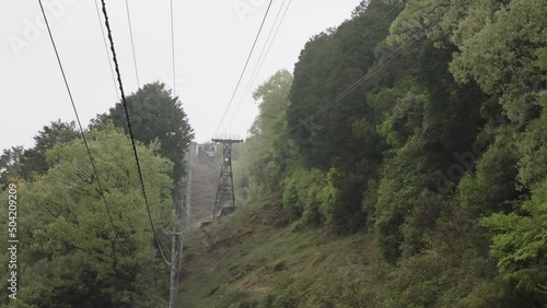 Mountain Ropeway in the mist on rainy day, Omihachiman Japan photo