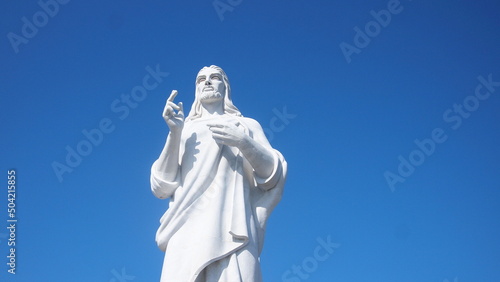 Monument to Jesus Christ, looking at Havana city, on a blue sky background, Cuba, Havana
