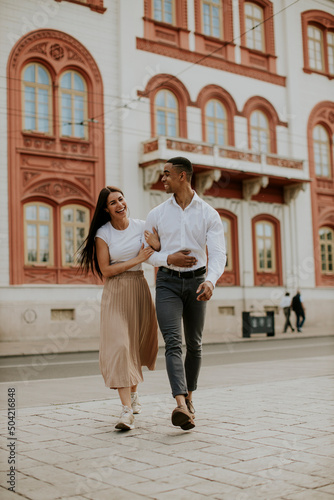 Young multiethnic couple wa...