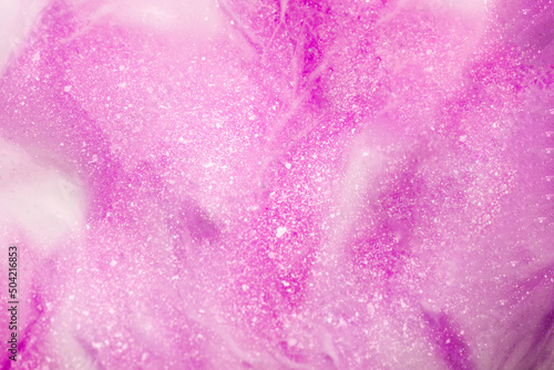 Liquid art gel pink gradient background with glitter. Slime toy. Abstract magenta and white surface. 