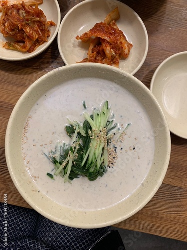 콩국수, 한식, 오이채 고명, 명동교자, 클로렐라면 / Cold bean noodles, Korean food, cucumber salad garnish, Myeongdong Gyoja, Chlorella noodles  photo