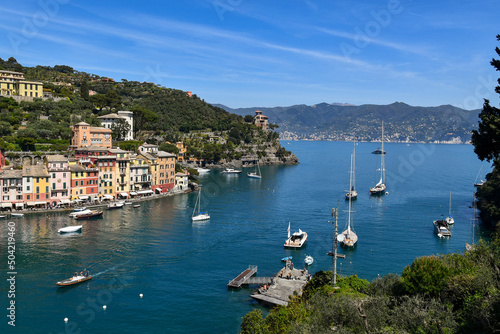 Elevated view of the historic fishing village and popular holiday resort on the shore of the Tigullio Gulf, Portofino, Genoa, Liguria, Italy