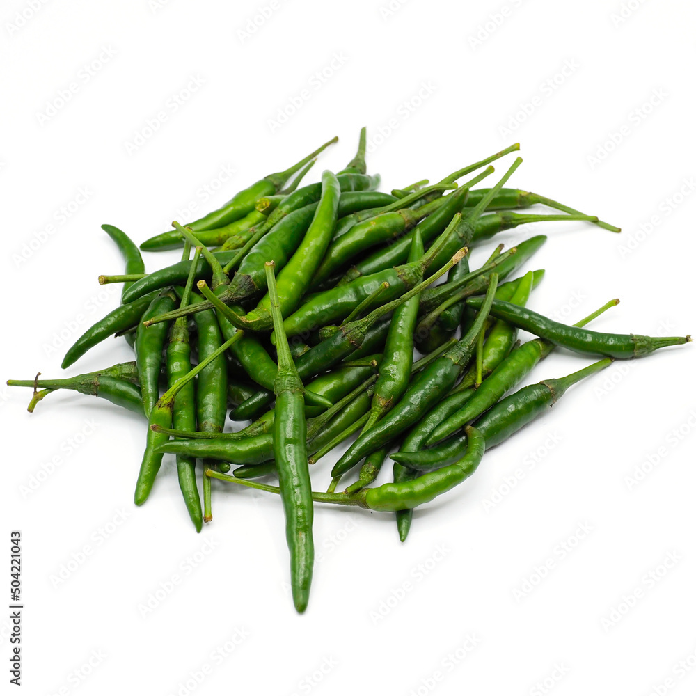 Heap of fresh green chilli on white background. Spot focus. Heap of fresh green chilli on white background. Spot focus.