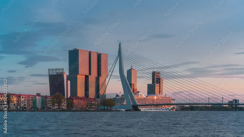 Sunset over the city skyline in Rotterdam, Netherlands Sunset over the city skyline in Rotterdam, Netherlands