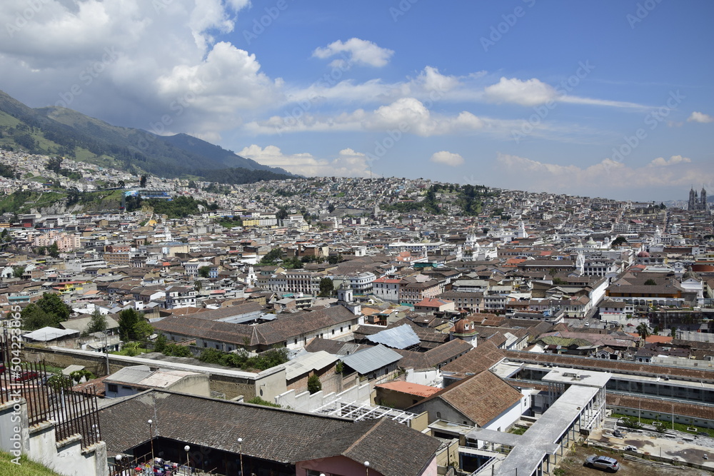 Aerial cityscape of the historic city center of Quito with the Compania de Jesus church dome