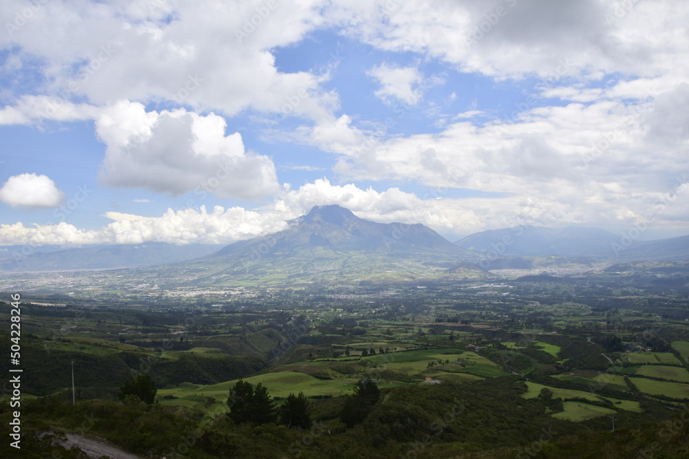 View of the small town of Otavalo at the foot of the mountain. Ecuador View of the small town of Otavalo at the foot of the mountain. Ecuador