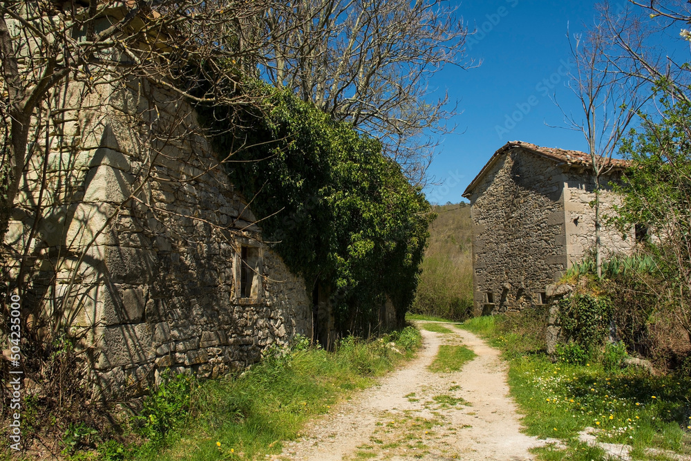 Derelict old residential buildings in the historic little medieval village of Kotli near Buzet in Istria, western Croatia
