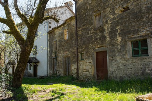 Old residential buildings in the historic little medieval village of Kotli near Buzet in Istria, western Croatia 
